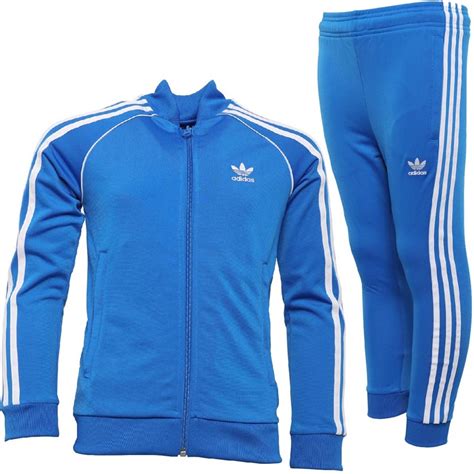 clear blue white adidas original shirt|Adidas blue tracksuit.